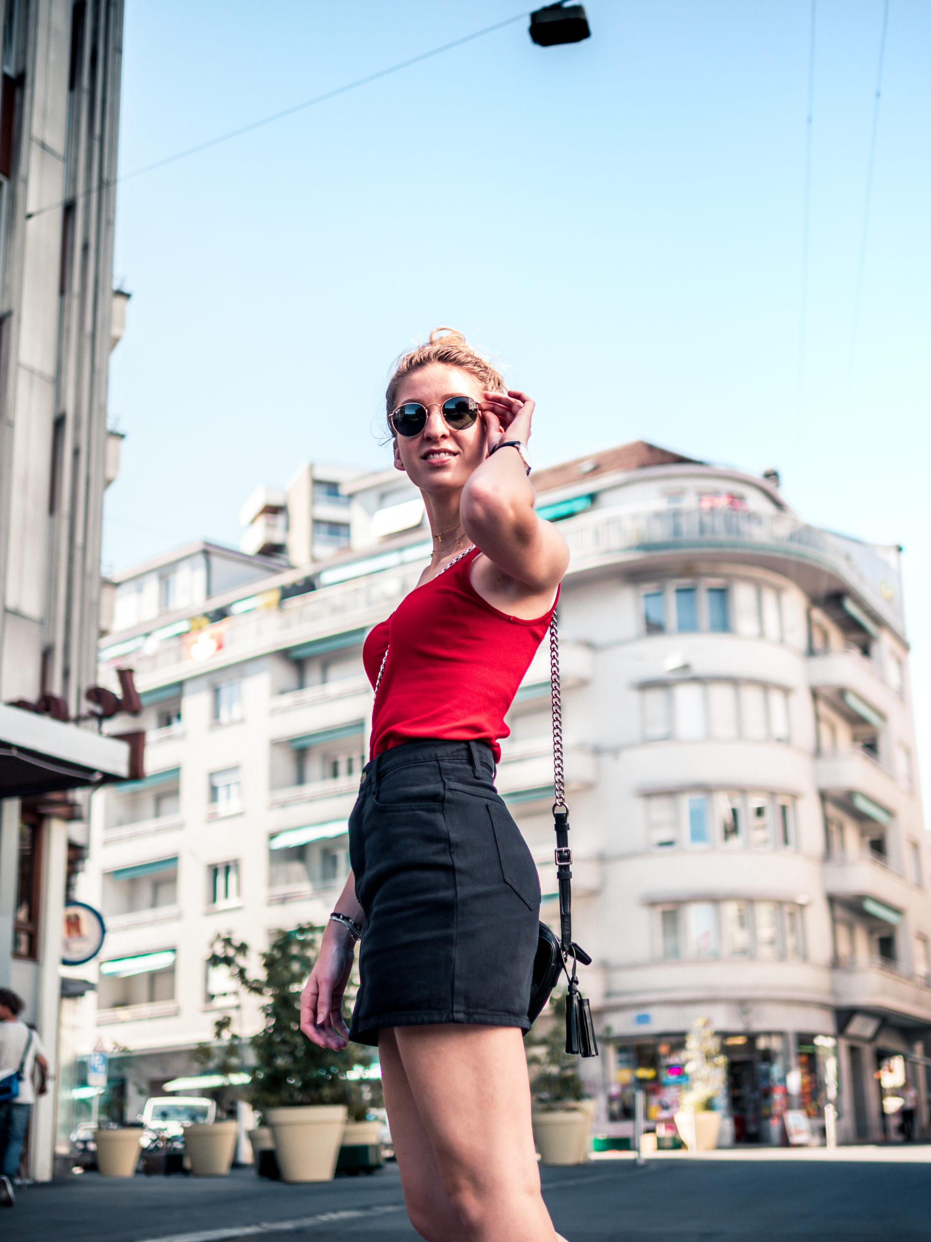 red top black skirt